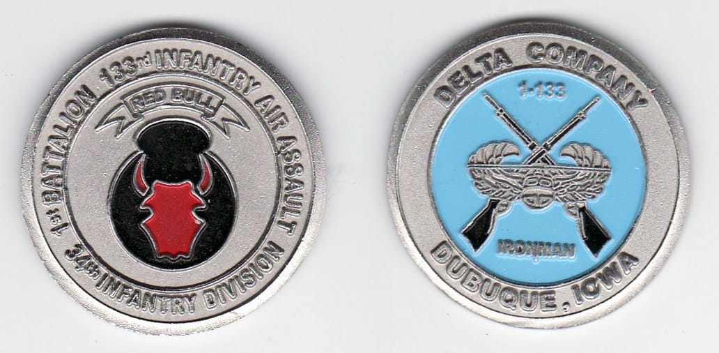 Round shaped, silver colored coin, 1-1/4 inches in diameter.