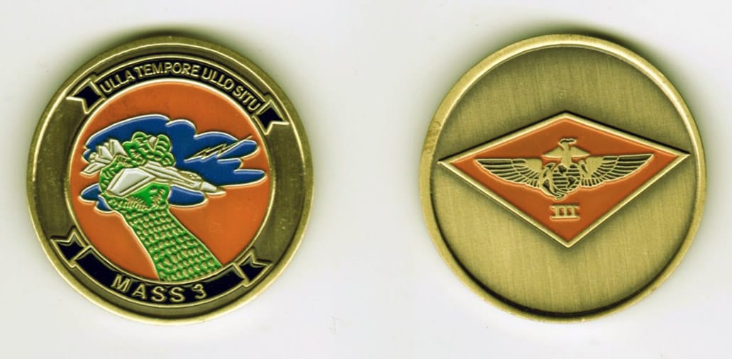 Round shaped, brass colored coin, 1-3/8 inches in diameter.