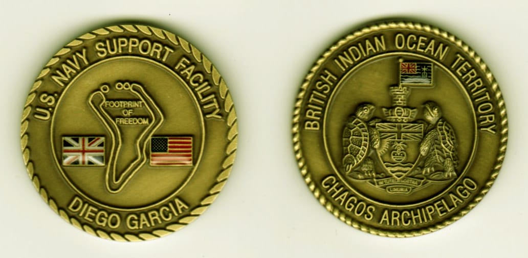 Round shaped, antique brass colored coin, 1-9/16 inches in diameter.