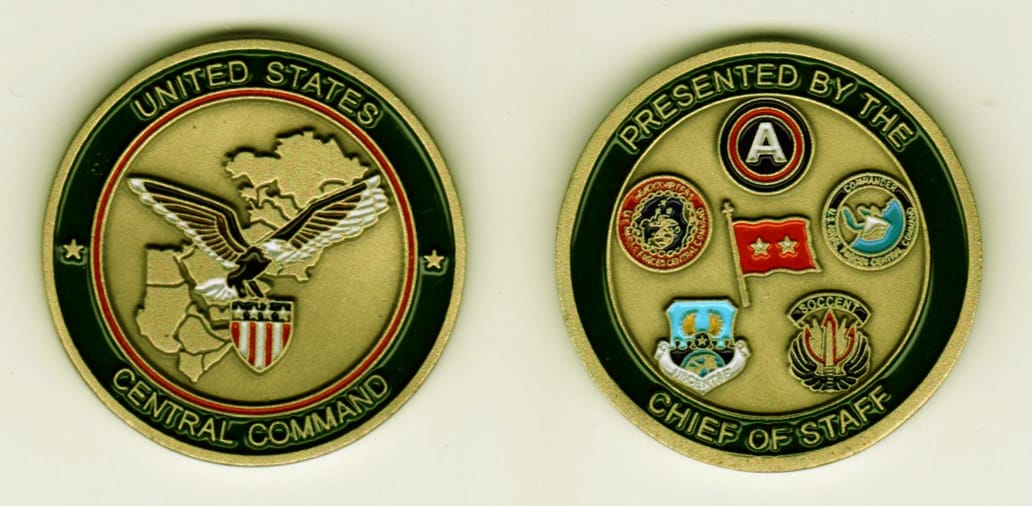 Round shaped, antique brass colored coin, 1-9/16 inches in diameter.