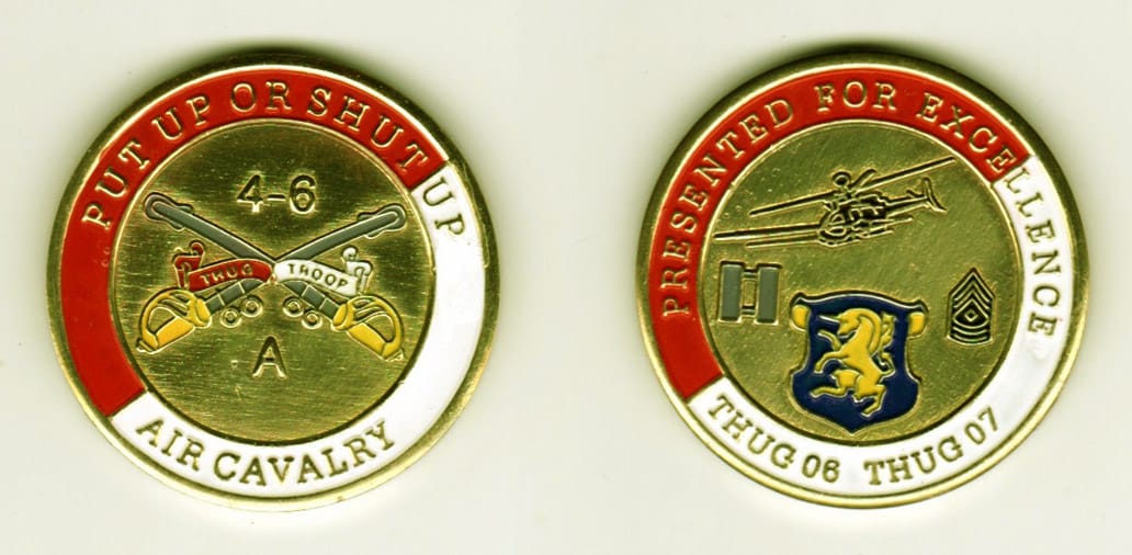 Round shaped, brass colored coin, 1-5/8 inches in diameter.