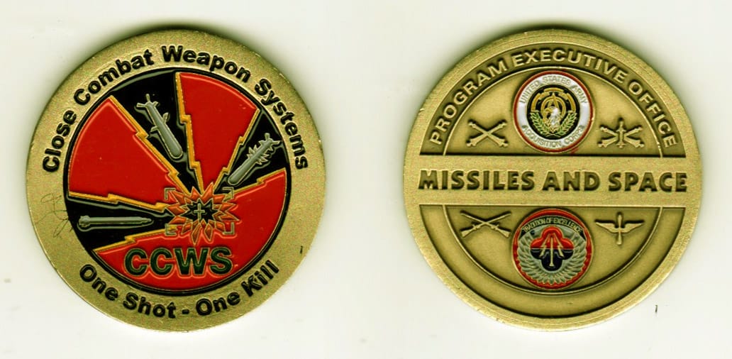 Round shaped, antique brass colored coin, 1-9/16 inches in diameter.