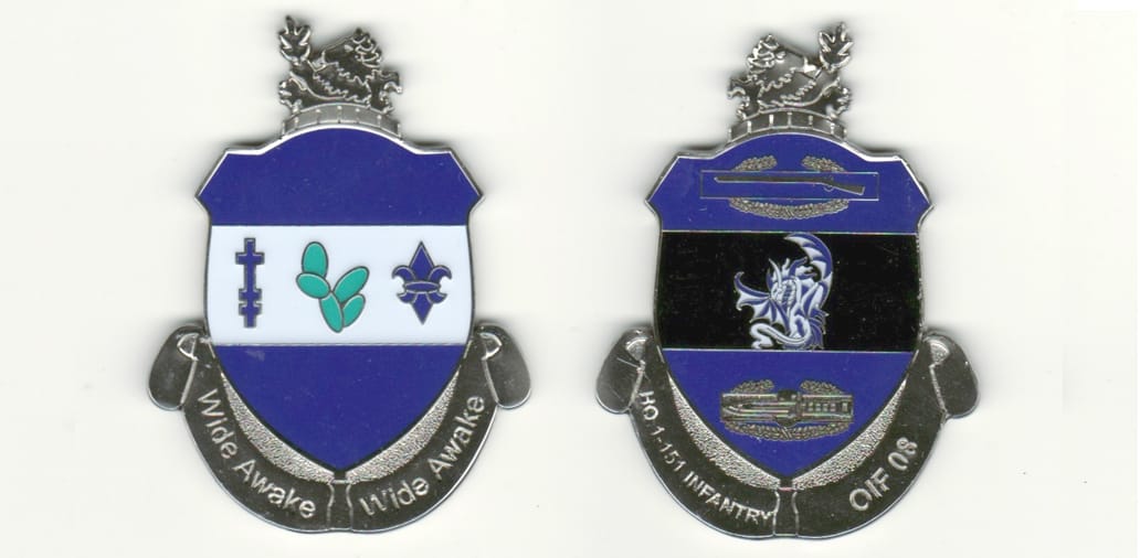 Shield shaped with banner beneath and horse rampant above, silver colored coin, 1-7/8 inches high x 1-1/2 inches wide.