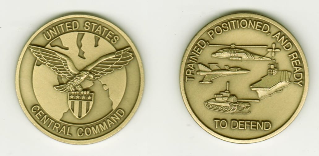 Round shaped, antique brass colored coin, 1-3/8 inches in diameter.