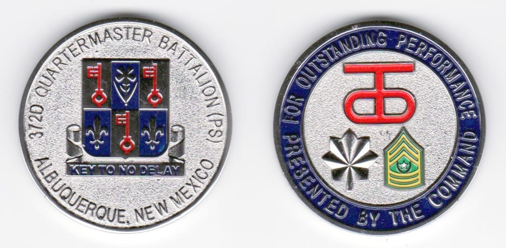 Round shaped, silver colored coin, 1-5/8 inches in diameter.