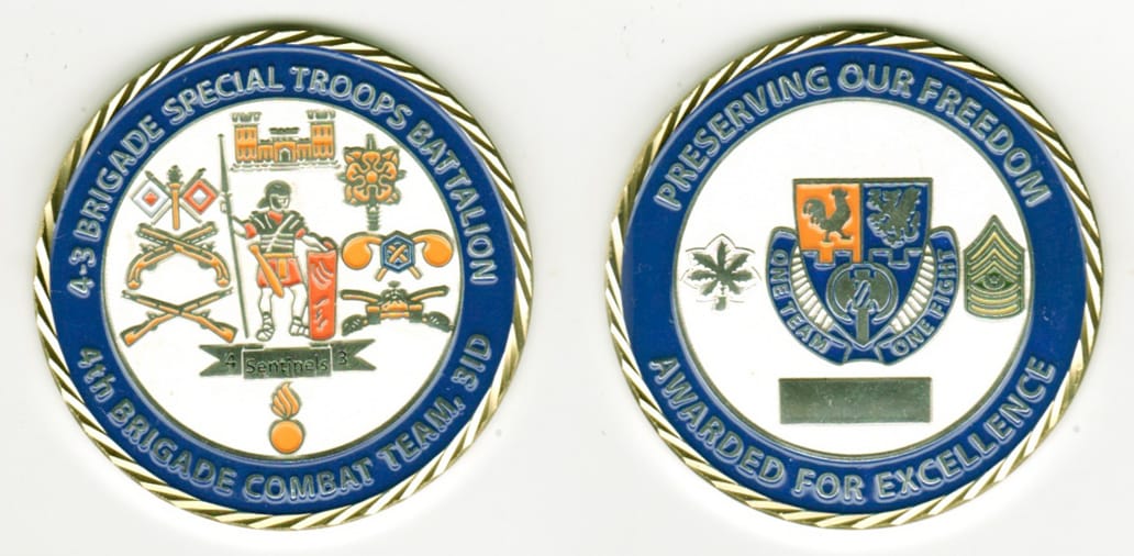 Round shaped, pewter colored coin, 2- 3/8 inches in diameter.