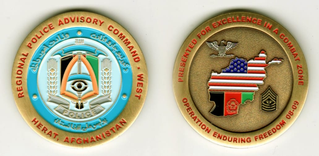 Round shaped, brass colored coin, 1-3/4 inches in diameter.