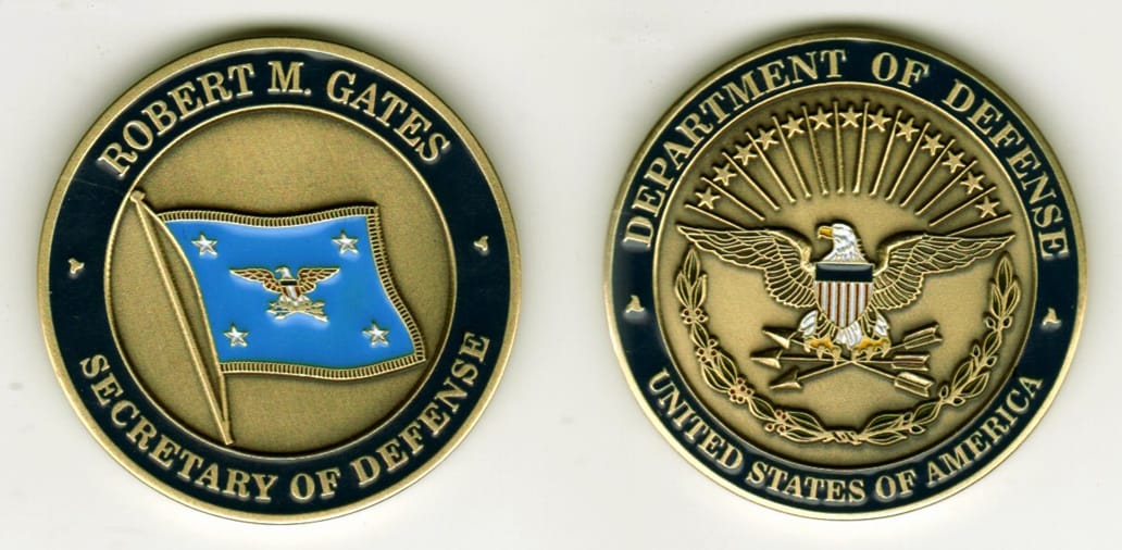 Round shaped, antique brass colored coin, 1-3/4 inches in diameter.