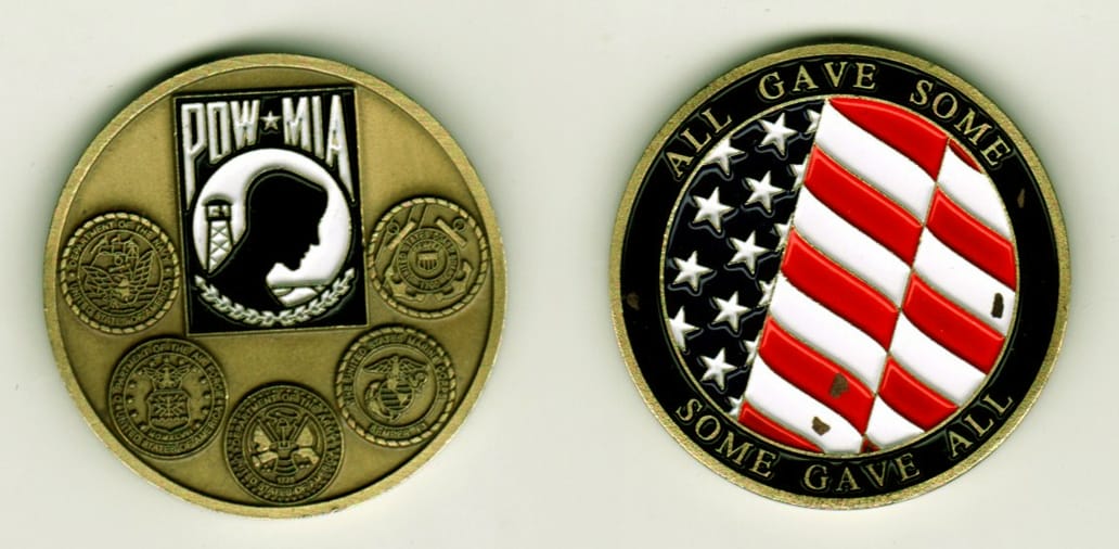 Round shaped, antique brass colored coin, 1-5/8 inches in diameter.