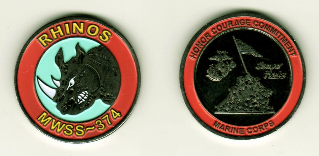 Round shaped, silver colored coin, 1-1/4 inches in diameter.