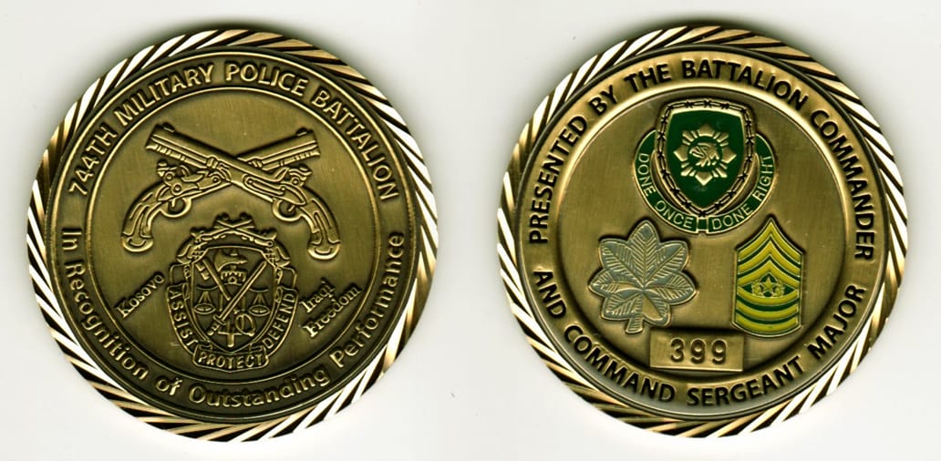 Round shaped, antique brass colored coin, 2-1/4 inches in diameter.