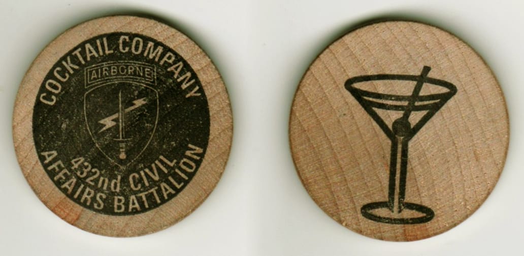 Round shaped, wood pog, 1-1/4 inches in diameter.