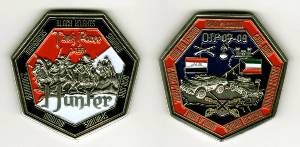 Heptagon shaped, pewter colored coin, 2 inches in diameter.