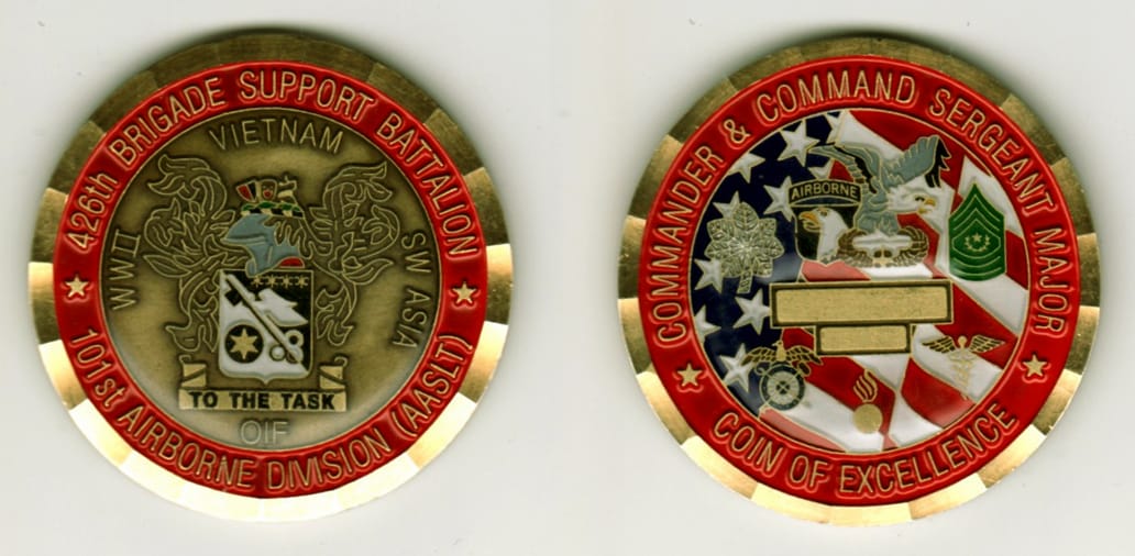 Round shaped, brass colored coin, 2-1/8 inches in diameter.