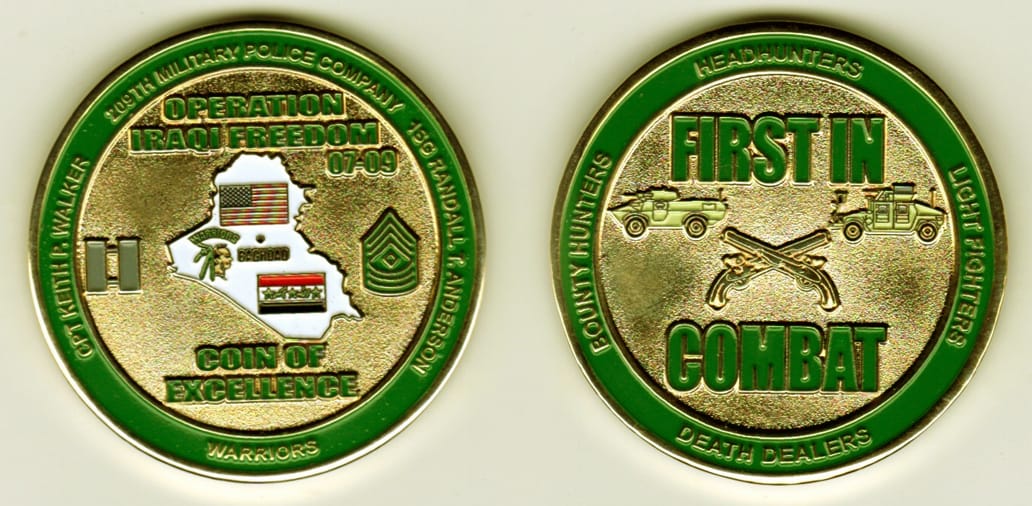 Round shaped, gold colored coin, 2-1/8 inches in diameter.