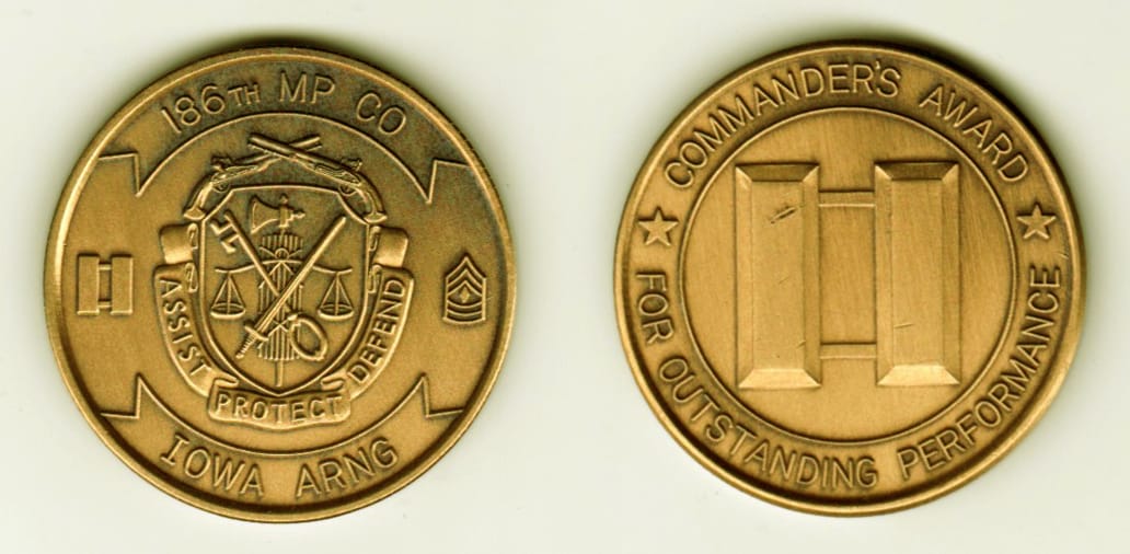 Round shaped,  brass colored coin, 1 1/2 inches in diameter.