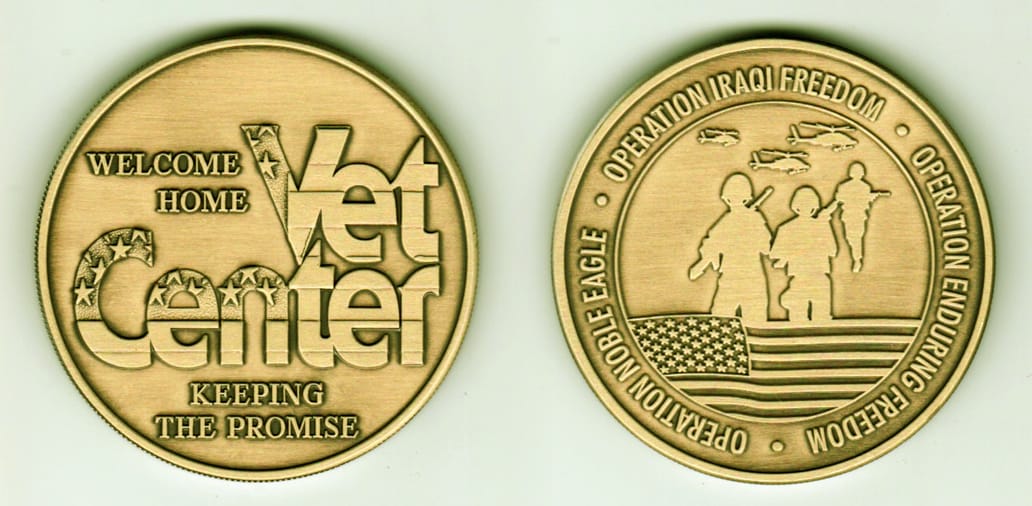 Round shaped, brass colored coin, 2 1/8inches in diameter.