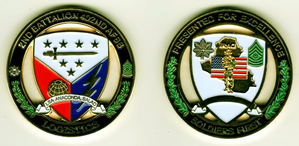 Round shaped, gold colored coin, 2 1/8 inches in diameter.