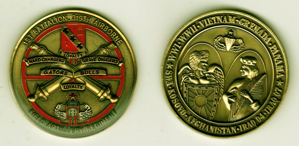 Round shaped, brass colored coin, 1 13/16 inches in diameter.