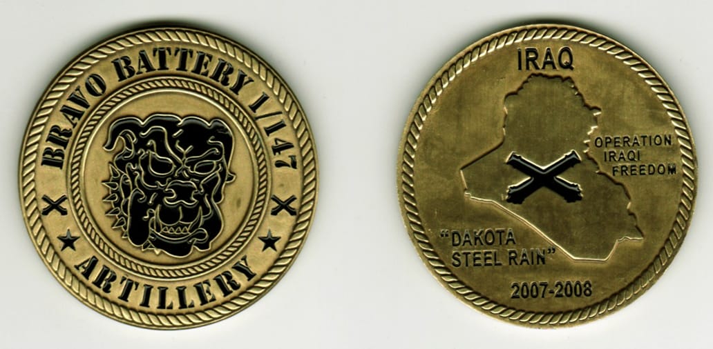 Round shaped, brass colored coin, 2 1/8 inches in diameter.