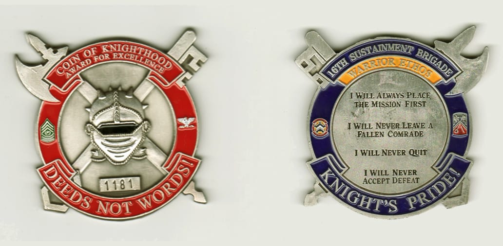 Round shaped with crossed ax and key extended, sliver colored coin, 2 1/2 inches wide x 2 1/2 inches high.