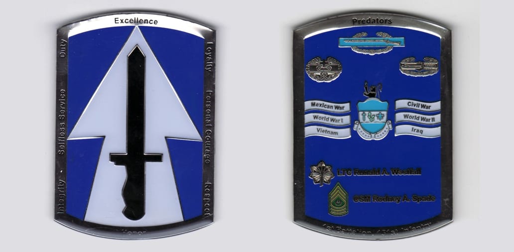 Retangular shaped with rounded top and bottom, silver colored coin, 2 1/4 inches wide x 3 inches high.