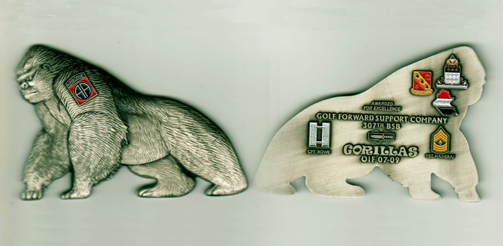 Gorilla shaped, silver colored coin, 4 inches wide x 2  inches high.