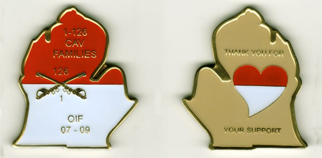 State of Michigan shaped, brass colored coin, 1 1/2 inches wide x 1 3/4 inches high.