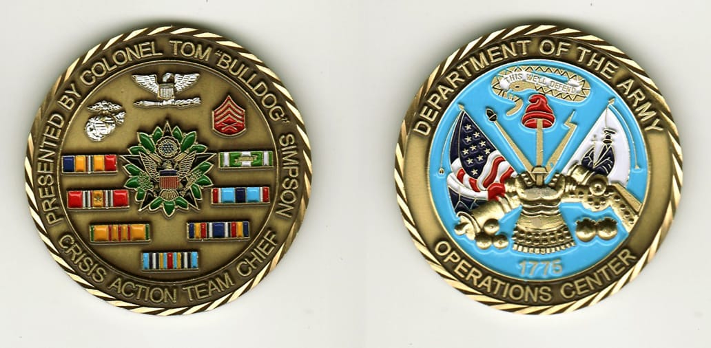 Round shaped, brass colored coin, 2 1/8 inches in diameter.