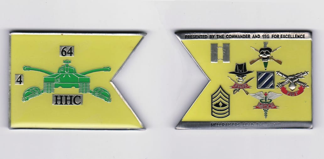 Flag shaped, black edged, yellow enameled coin 2 1/2  inches wide x 1 1/2 inches high.