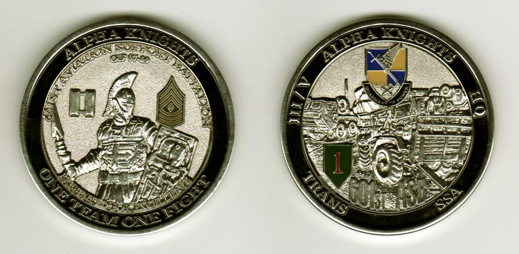 Round shaped, silver colored coin, 2 1/8  inches in diameter.