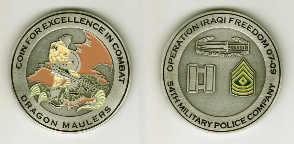 Round shaped, pewter colored coin, 2 1/8  inches in diameter.