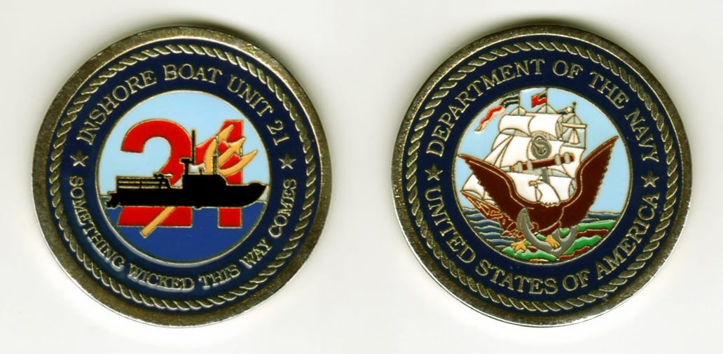 Round shaped, gold colored coin, 1-5/8  inches in diameter.