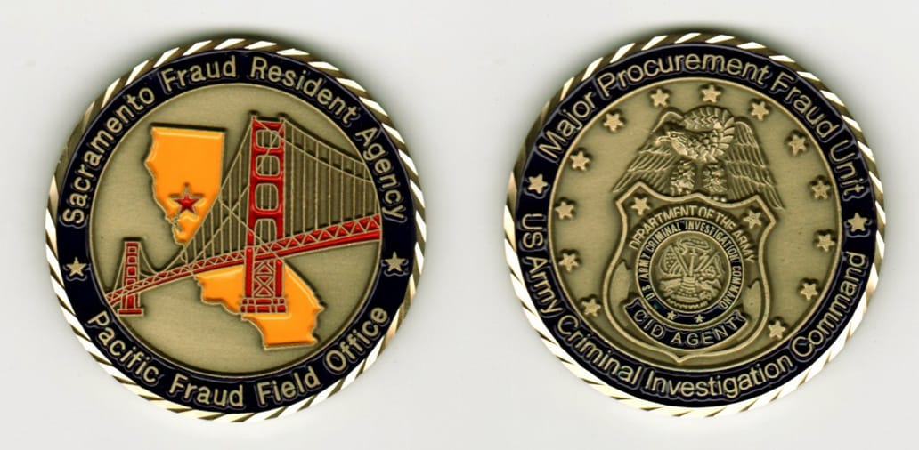 Round shaped, brass colored coin, 1 13/16  inches in diameter.