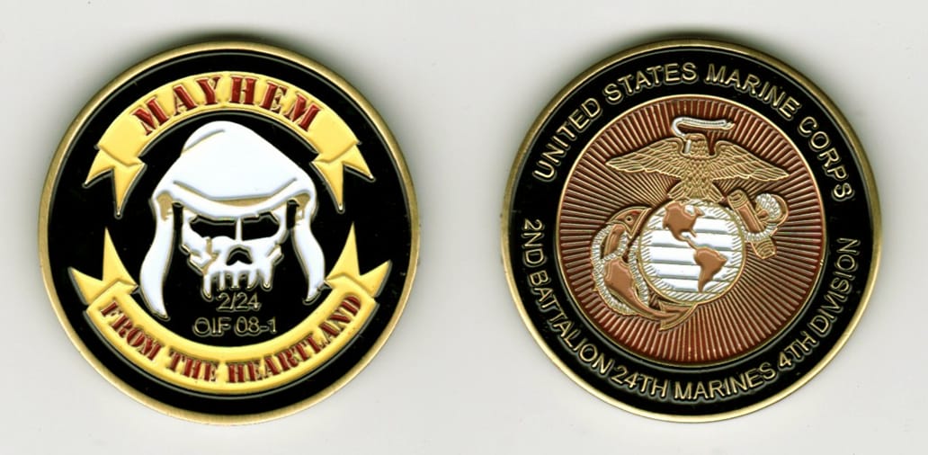 Round shaped, antique brass colored coin, 1-5/8 inches in diameter.