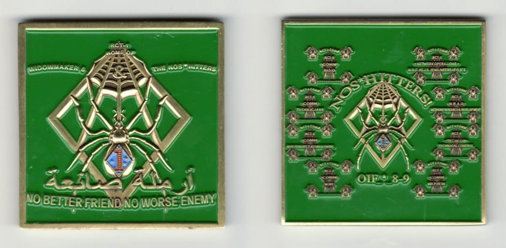 Square shaped, brass colored coin, 2 inches wide x 2  inches high.