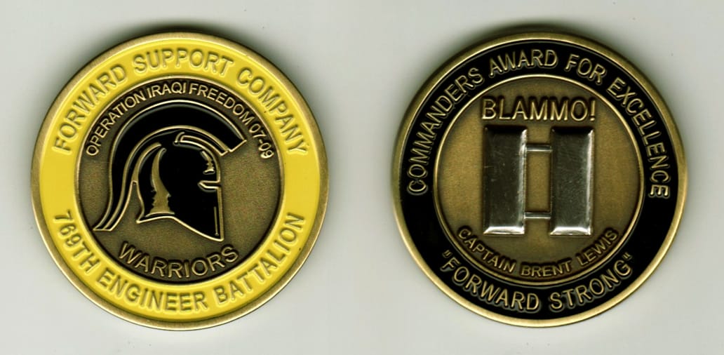 Round shaped, brass colored coin, 1 11/16  inches in diameter.