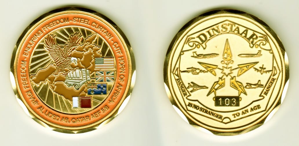 Round shaped, gold colored coin, 2  inches in diameter.