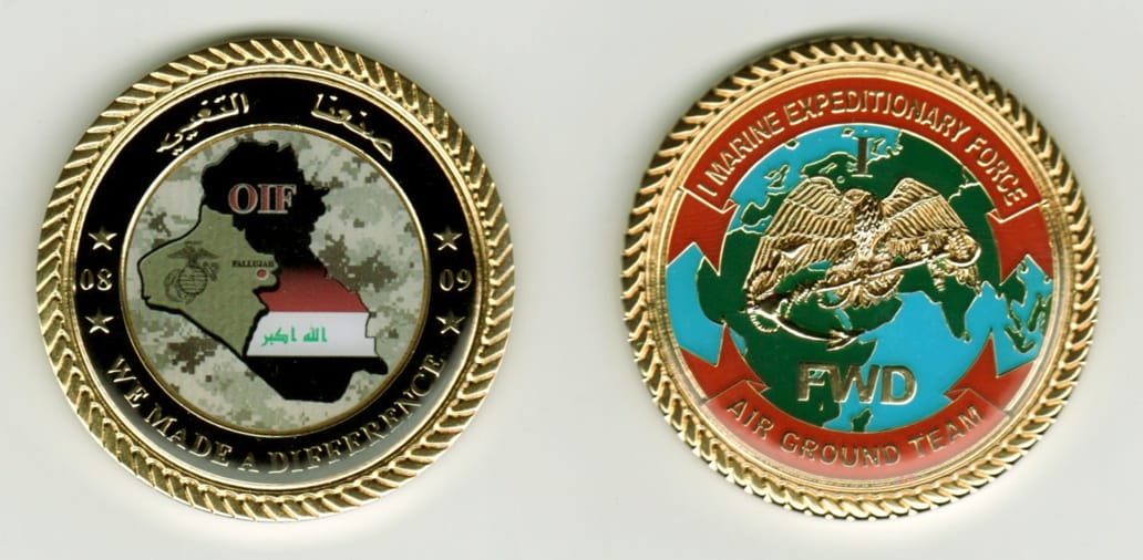 Round shaped, gold colored coin, 2 1/8  inches in diameter.