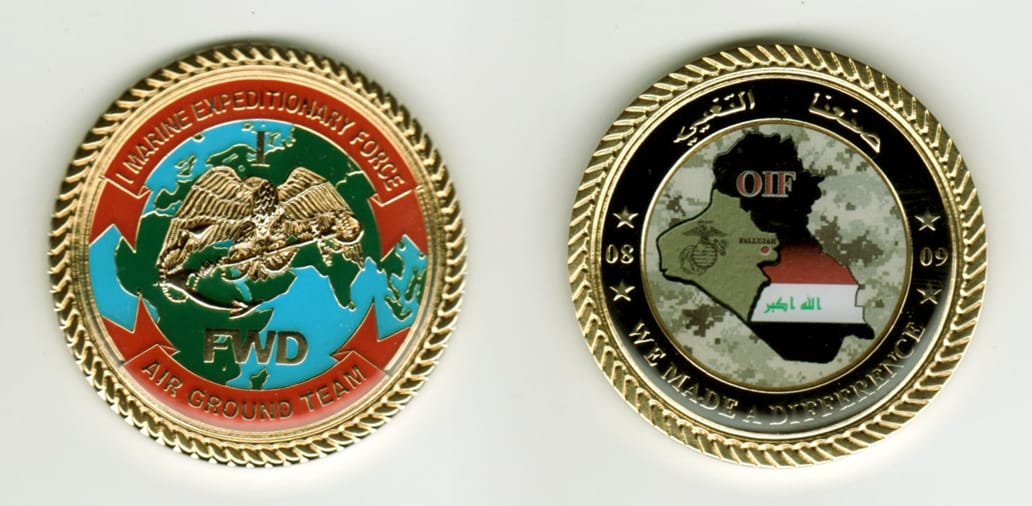 Round shaped, gold colored coin, 2 1/8  inches in diameter.