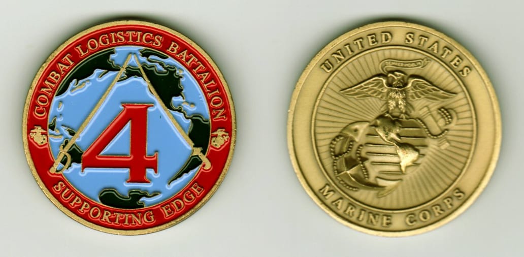 Round shaped, brass colored coin, 1 11/16  inches in diameter.