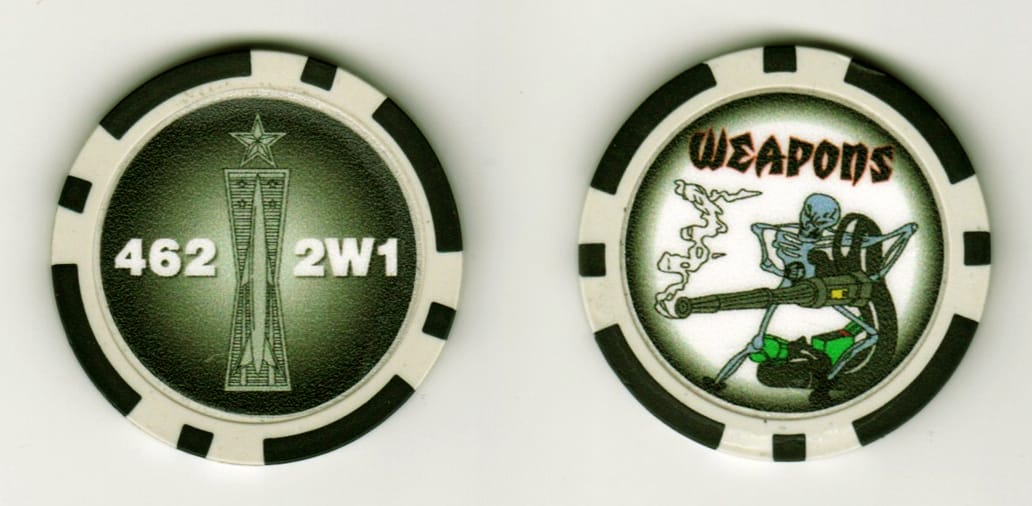 Round shaped, poker chip, 1 1/4  inches in diameter.