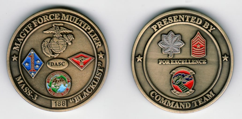 Round shaped, pewter colored coin, 1 11/16  inches in diameter.