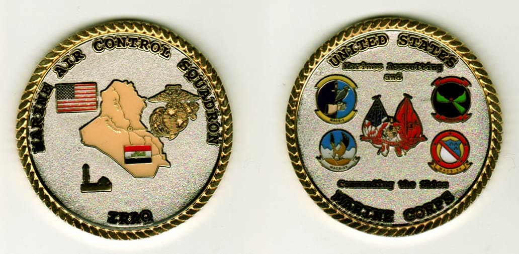Round shaped, silver colored coin w/ gold colored rim, 2 inches in diameter.