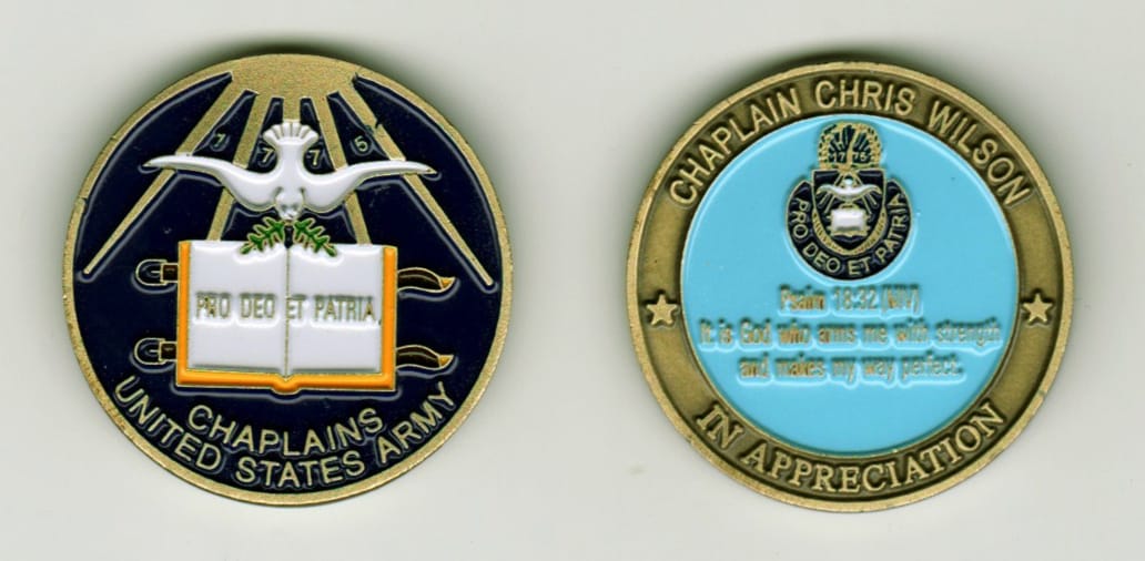 Round shaped, antique brass colored coin, 1 1/4 inches in diameter.