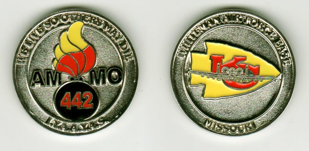 Round shaped, silver colored coin, 1 1/4 inches in diameter.