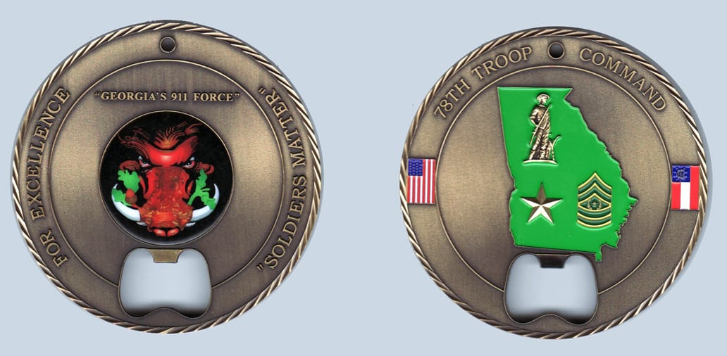 Round shaped, pewter colored coin, 3 1/2 inches in diameter.