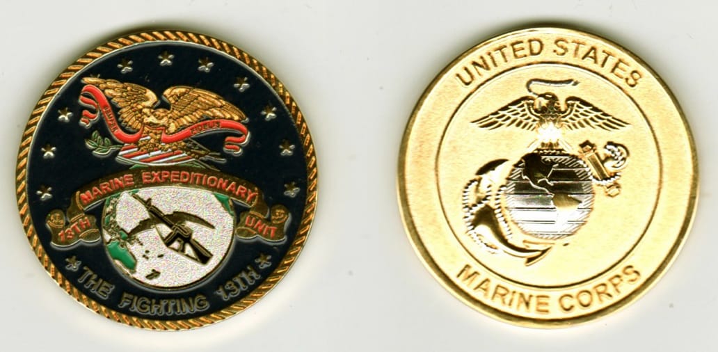 Round shaped, brass colored coin, 1-5/8 inches in diameter.