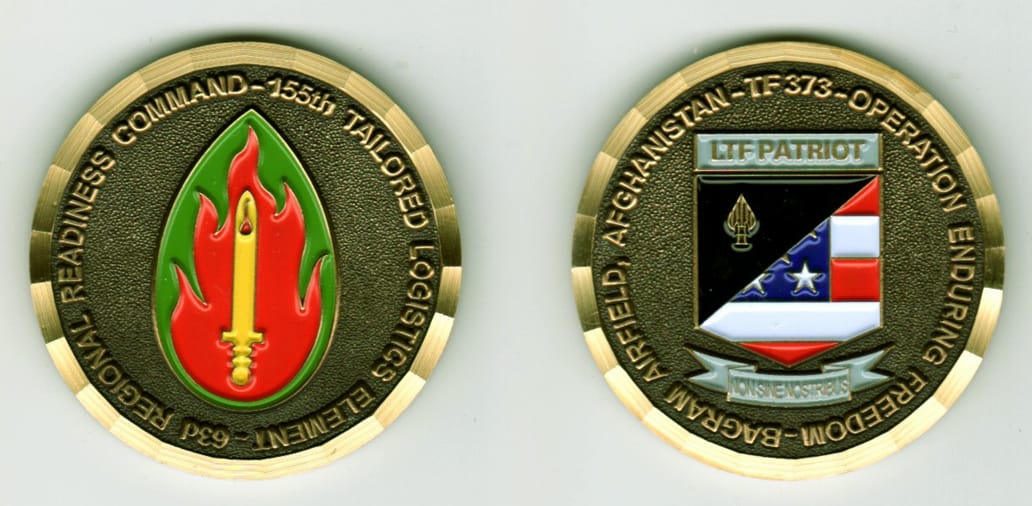 Round shaped, gold colored coin, 1-5/8 inches in diameter.