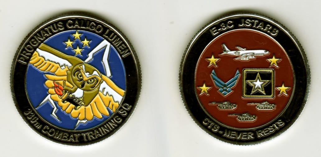 Round shaped, silver colored coin, 1 13/16 inches in diameter.